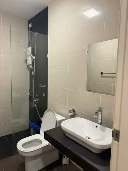 Bathroom features: glass shower enclosure, rain shower head, handheld shower, white ceramic toilet, single-sink vanity with white basin, wall-mounted faucet, mirror above sink, black countertop, tile flooring, light-colored wall tiles, dark accent wall tiles; style: modern.