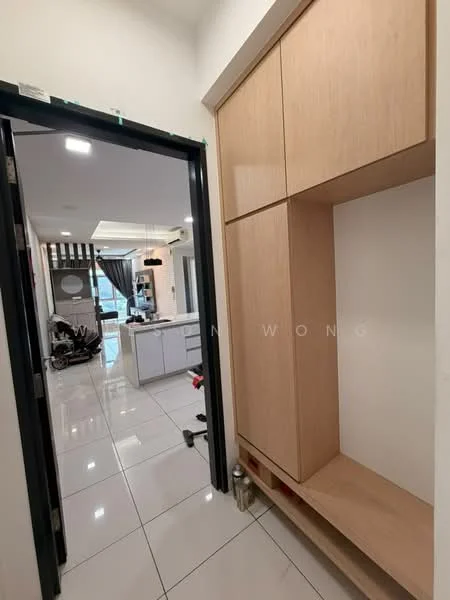Room features: white painted walls, glossy tile flooring, built-in wooden cabinetry, open space layout, doorway leading to another room, recessed lighting, visible kitchen area in background, modern design; style: modern.