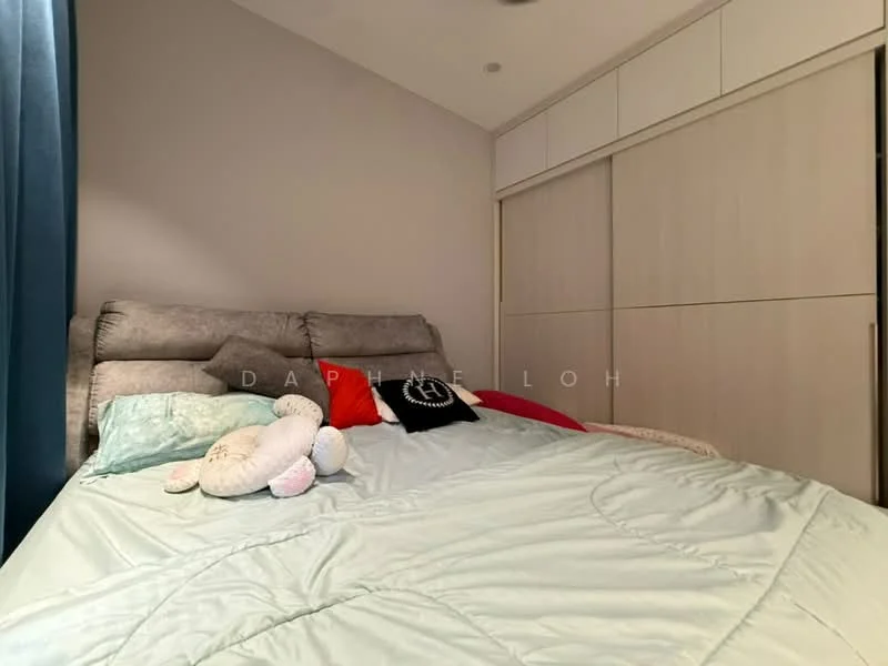Bedroom features: queen-size bed with upholstered headboard, light grey bedding, decorative pillows, built-in wardrobe with sliding doors, grey accent wall, white ceiling, curtains in dark blue, soft plush toys on bed; style: modern.