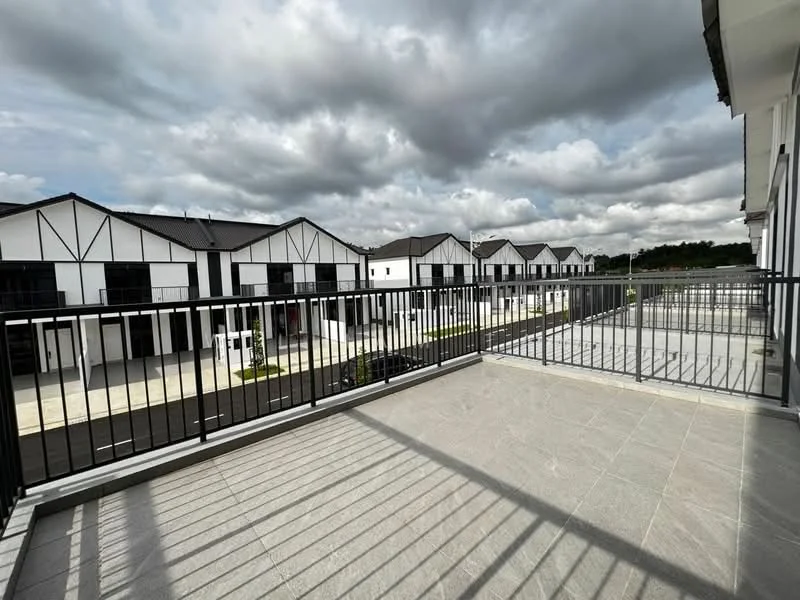Exterior type: linked terrace house; features: black metal railing, grey tiled flooring, cloudy sky, row of houses in background, paved walkway, landscaped garden in front of houses; style: modern.
