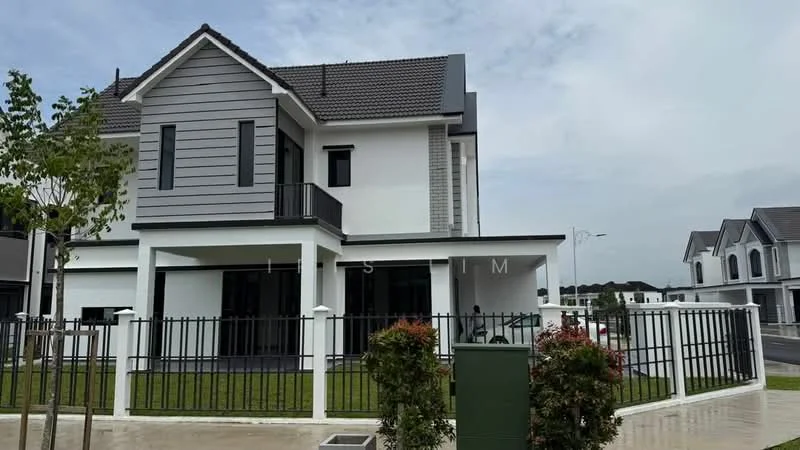 Exterior type: semi-detached house; features: grey and white painted facade, pitched tile roof, two-storey structure, manicured lawn, fenced perimeter, balcony on upper floor, large windows, driveway, landscaped garden, modern architectural design; style: modern.