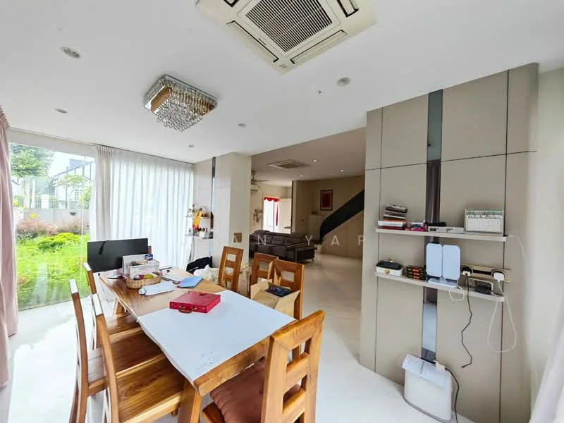 Dining features: wooden dining table, 6 dining chairs, chandelier, air conditioning unit, white walls, large windows with sheer curtains, decorative wall paneling, open layout to living area; style: modern; view: garden. Room features: white tiled flooring, wall-mounted shelves, TV console, staircase visible in background.