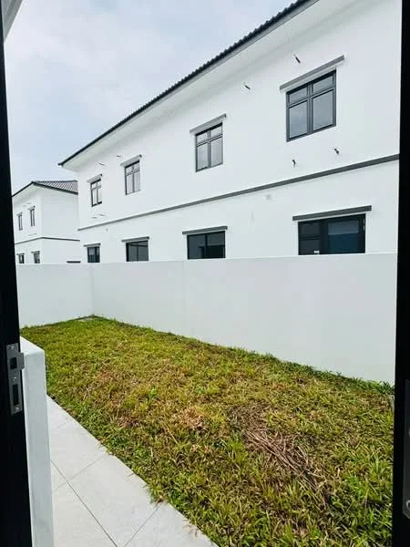 Exterior type: linked terrace house; features: white painted facade, two-storey building, flat roof, manicured lawn, fenced yard, multiple windows, concrete pathway, surrounded by greenery; style: modern.
