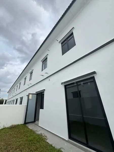 Exterior type: linked terrace house; features: white painted facade, flat roof, single-storey, large windows, glass door, manicured lawn, concrete pathway; style: modern.