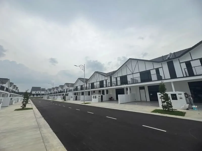 Exterior type: linked terrace house; features: white painted facade, black accents on facade, pitched tile roof, two-storey, manicured landscaping, paved driveway, street lighting, balconies on upper floor, front yard with small trees; style: modern.