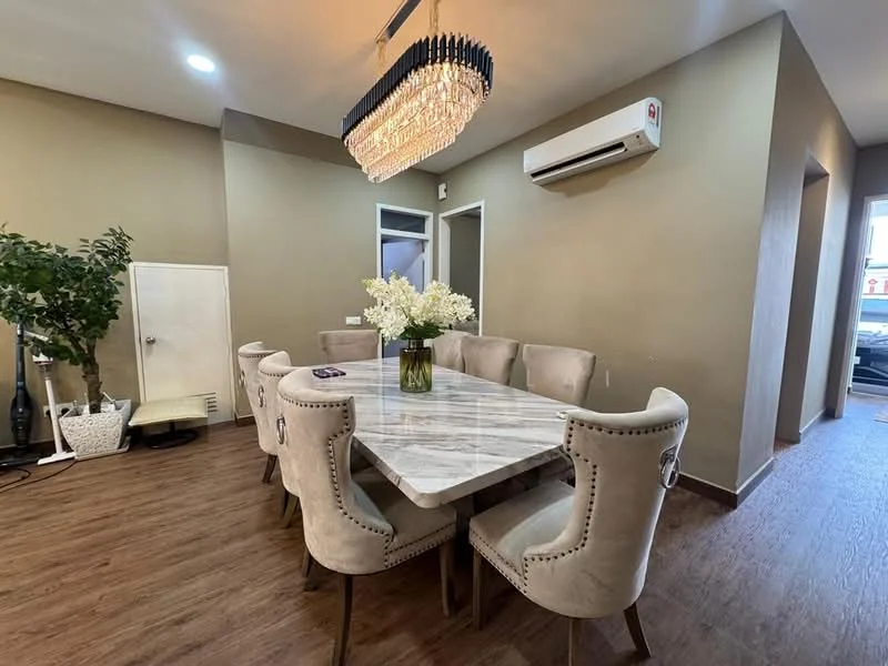 Dining features: marble dining table, 8 upholstered dining chairs with studded detailing, chandelier with crystal accents, wall-mounted air conditioning unit, wooden flooring, decorative plant in corner, cream painted walls, white decorative vase with flowers; style: modern.