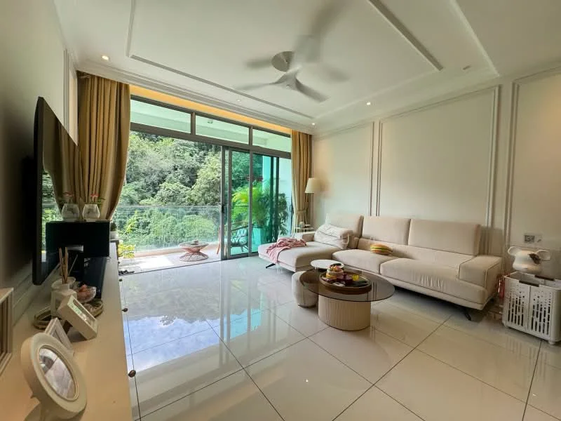 Living features: white painted walls, tray ceiling, 5-blade ceiling fan, large floor-to-ceiling sliding glass door, cream fabric sofa, round coffee table, TV console, wall-mounted TV, area rug, curtains, marble tile flooring, decorative plants, decorative throw blanket; style: modern; view: garden.