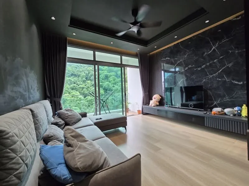 Living features: L-shape sectional sofa in grey, decorative cushions in blue, wooden flooring, black feature wall with marble finish, floor-to-ceiling windows, sheer curtains, 5-blade ceiling fan with light, wall-mounted TV, TV console with storage, potted plant, teddy bear decor, natural greenery view; style: modern; view: garden.