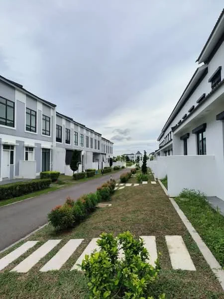 Exterior type: linked terrace house; features: two-storey linked terrace houses, grey and white painted facade, manicured lawn, paved walkway, landscaped garden, street view, surrounded by greenery; style: modern.