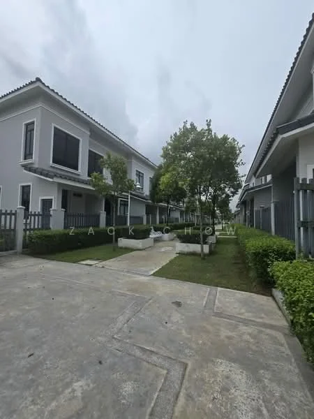 Exterior type: linked terrace house; features: grey painted facade, two-storey building, manicured lawn, mature trees, stone-paved walkway, fenced perimeter, driveway with interlocking pavers, gated entry; style: modern.