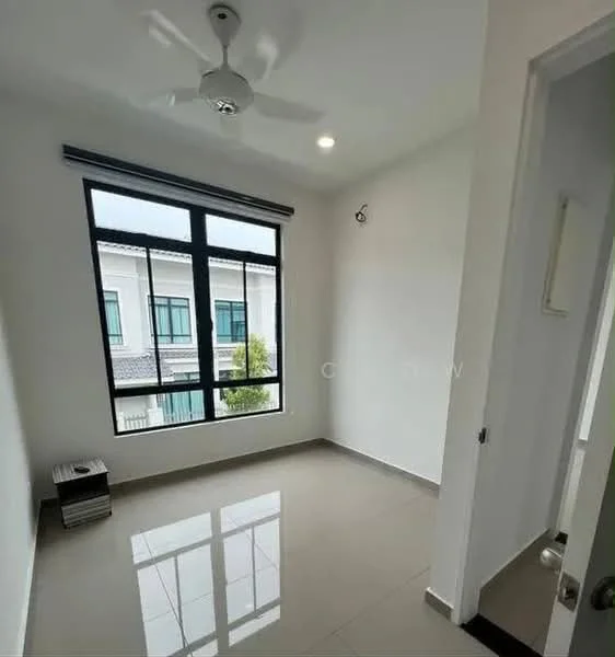 Room features: white painted walls, glossy tile flooring, 5-blade ceiling fan, large windows with black frames, window treatments, corner light fixture, doorway leading to another room, small shelving unit; style: modern; view: garden.