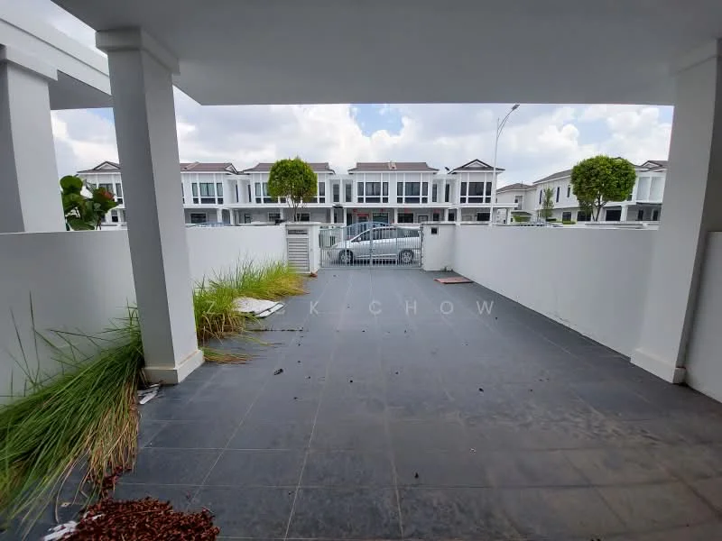 Exterior type: linked terrace house; features: paved flooring, white painted walls, manicured lawn, surrounded by low fencing, driveway visible, landscaping with shrubs, two-storey houses in background, clear sky, urban setting; style: modern.