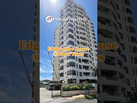 Exterior type: high-rise condominium; features: white painted facade, glass curtain wall, recessed balconies, approximately 10-storey high-rise, surrounded by mature greenery, crane visible for construction, main entrance gate, landscaped garden at entrance; style: modern.