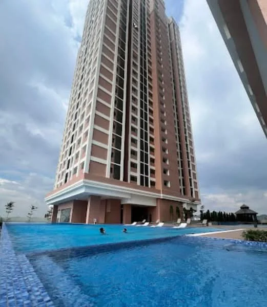 Exterior type: high-rise condominium; features: tall residential tower, swimming pool with blue tiles, pool deck with loungers, landscaped garden area, outdoor gazebo, surrounding greenery, city skyline in background; style: modern.