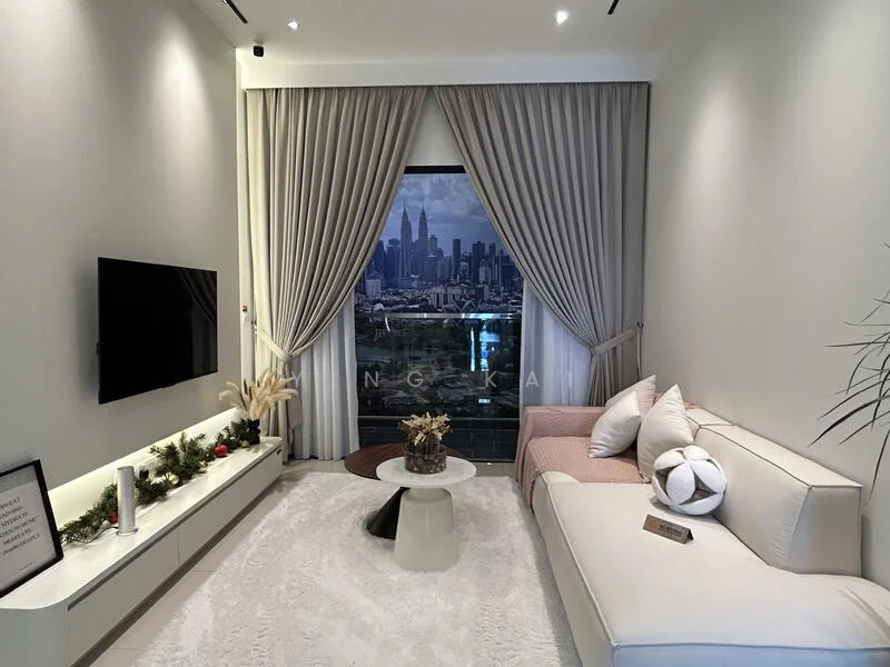 Living features: floor-to-ceiling windows, city skyline view, white painted walls, light grey sofa, decorative cushions, white area rug, wall-mounted TV, minimalist TV console, potted plant, decorative vase, curtains, coffee table; style: modern; view: city.