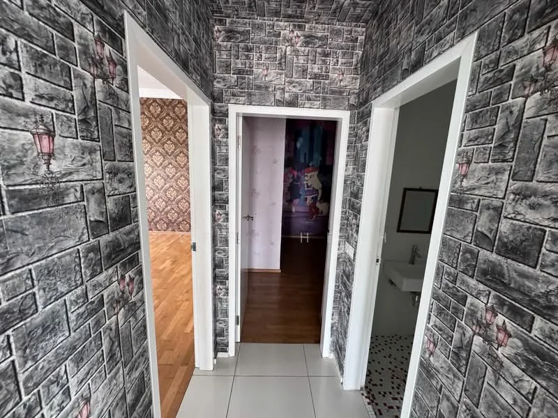 Hallway features: grey brick-patterned wallpaper, white painted doors, tile flooring, wall-mounted light fixtures, wooden flooring visible in adjacent room; style: modern. Room features: plain wallpaper, wooden flooring visible.