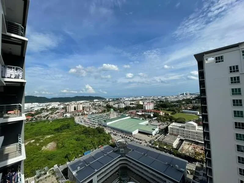 Exterior type: high-rise condominium; features: city skyline view, surrounded by greenery, multiple buildings in view, open sky, urban landscape, road visible in foreground; style: modern.