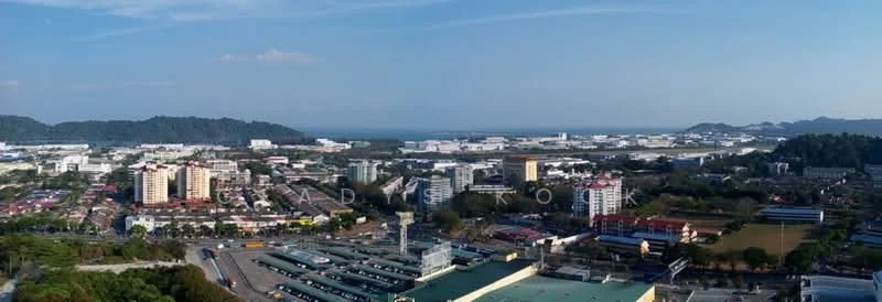 Exterior features: city skyline, ocean view, surrounded by greenery, multiple buildings, parking lot, commercial area, mountain backdrop, clear blue sky; style: modern.