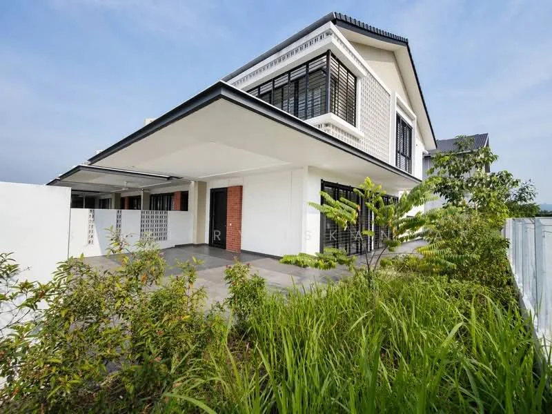 Exterior type: detached bungalow; features: white painted facade, exposed brick accents, flat roof, approximately 2-storey, manicured lawn, landscaping with shrubs, paved walkway, large windows, balconies with black railings, surrounded by greenery; style: modern.