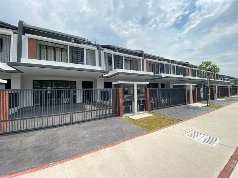 Exterior type: linked terrace house; features: two-storey building, grey painted facade, brick accents, recessed balconies, metal railing, paved walkway, manicured lawn, gated entry, front porch, driveway, landscaped garden; style: modern.