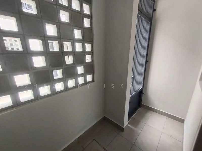 Room features: grey tiled flooring, white painted walls, decorative block window, metal door, corner layout; style: modern.