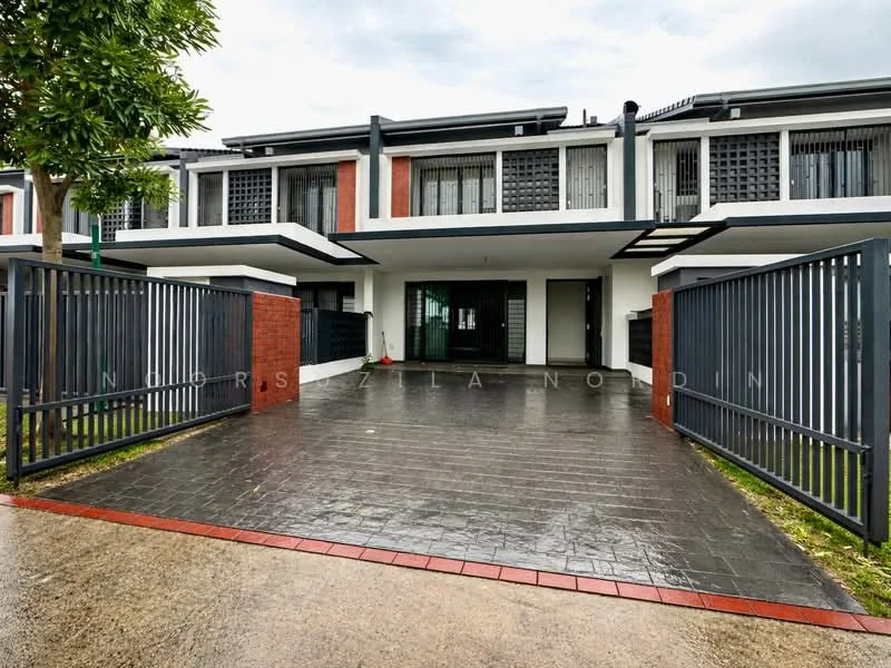 Exterior type: linked terrace house; features: grey painted facade, red brick accents, sliding gate, manicured lawn, paved driveway, two-storey structure, balconies with decorative screens, large windows, modern architectural design; style: modern.