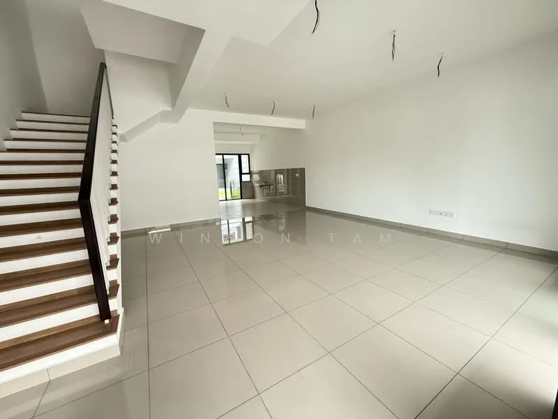 Living features: white painted walls, grey tile flooring, staircase with wooden steps and black railing, large windows for natural light, open layout, recessed ceiling, no visible furniture, neutral color scheme; style: modern.