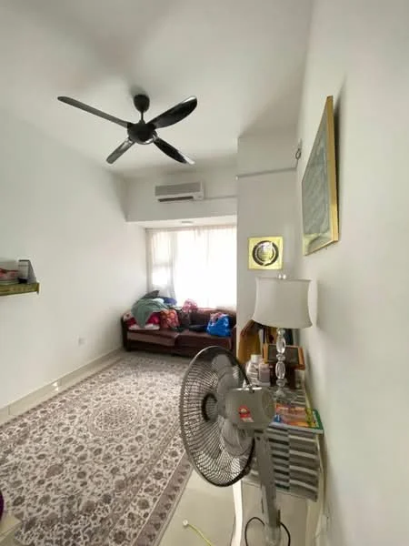 Living features: 5-blade ceiling fan, wall-mounted split AC, white painted walls, cream tiled flooring, area rug with geometric pattern, sofa with cushions, decorative wall art, window with sheer curtains, table lamp, books on side table; style: modern.