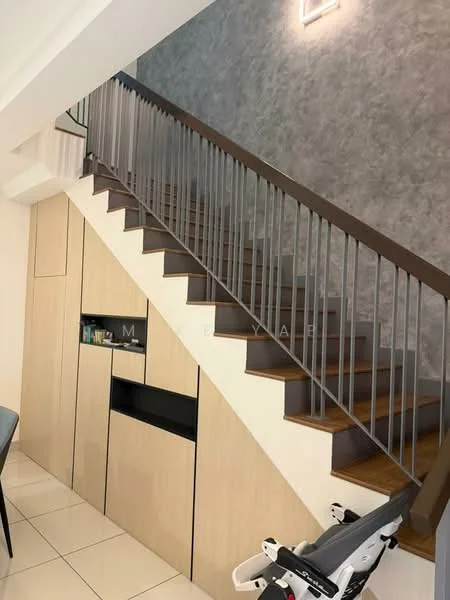 Room features: wooden staircase with metal railing, light grey accent wall, built-in cabinetry with light wood finish, white tiled flooring, recessed lighting, open space under the staircase, modern design elements; style: modern.