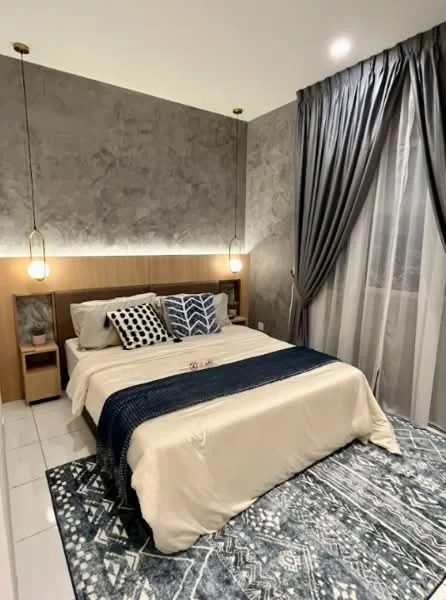 Bedroom features: king-size bed, upholstered headboard, decorative pillows, bedside tables, pendant lights, grey accent wall, white painted walls, floor-to-ceiling curtains, area rug with geometric pattern, white tiled flooring; style: modern.