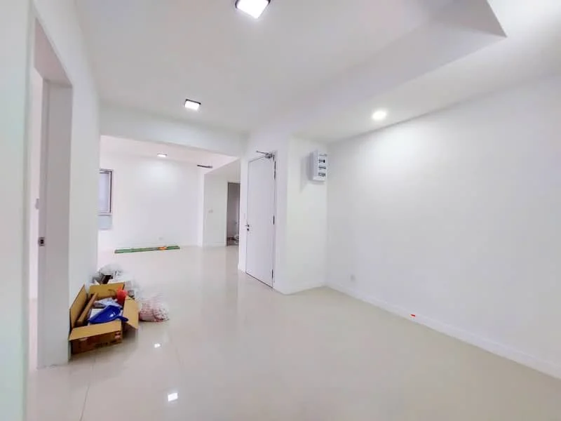 Room features: white painted walls, glossy tile flooring, recessed downlights, air conditioning unit on wall, open layout, no visible furniture, neutral color scheme, large windows, doorway leading to another room; style: modern.