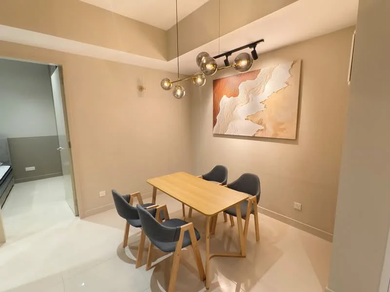 Dining features: wooden dining table, 4 upholstered dining chairs in grey, pendant light fixture with multiple bulbs, cream painted walls, glossy white tile flooring, framed abstract artwork on wall, recessed ceiling lights; style: modern.