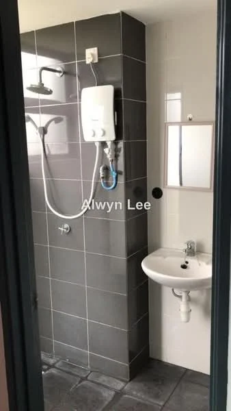 Bathroom features: shower with wall-mounted rain shower head, handheld shower, white ceramic sink, chrome basin mixer, mirror, grey tiled walls, dark grey floor tiles, water heater, shower curtain rod, wall-mounted soap dispenser; style: modern.