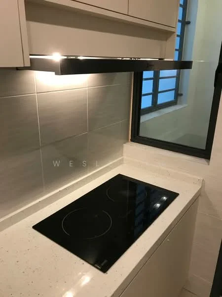 Kitchen features: black glass induction cooktop, white quartz countertop, light grey tiled backsplash, under-cabinet lighting, built-in cabinetry, window with black frame, neutral wall colour, modern range hood; style: modern.