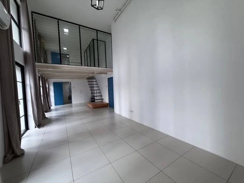 Living features: white painted walls, tile flooring, high ceiling, large windows with black frames, curtains in light grey, open staircase with wooden steps, metal railing, wooden platform area, air conditioning unit on wall, recessed lighting; style: modern.