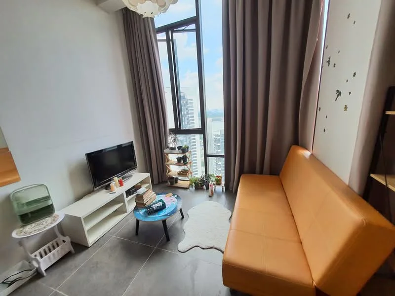 Living features: orange leather sofa, coffee table, wall-mounted TV, floor-to-ceiling windows, sheer curtains, grey tile flooring, decorative wall stickers, shelving unit with plants, area rug, light fixture with multiple bulbs; style: modern; view: city.