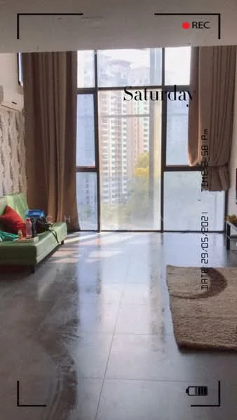 Living features: large floor-to-ceiling windows, grey tiled flooring, green fabric sofa, decorative throw pillows, area rug, curtains, wall-mounted decor, coffee table; style: modern; view: city.
