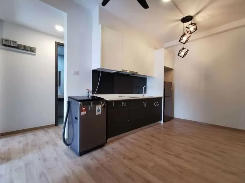 Kitchen features: white upper cabinets, black lower cabinets, stainless-steel sink, chrome pull-down faucet, countertop with white surface, refrigerator, pendant lighting, ceiling fan, laminate flooring, open layout, wall-mounted electrical panel; style: modern.