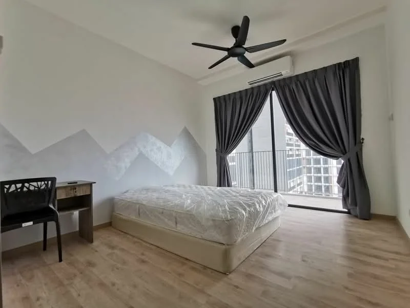 Bedroom features: queen-size bed with mattress protector, 5-blade ceiling fan with light, floor-to-ceiling sliding glass door, grey curtains, wooden flooring, white painted walls, desk with chair, balcony access; style: modern; view: city.