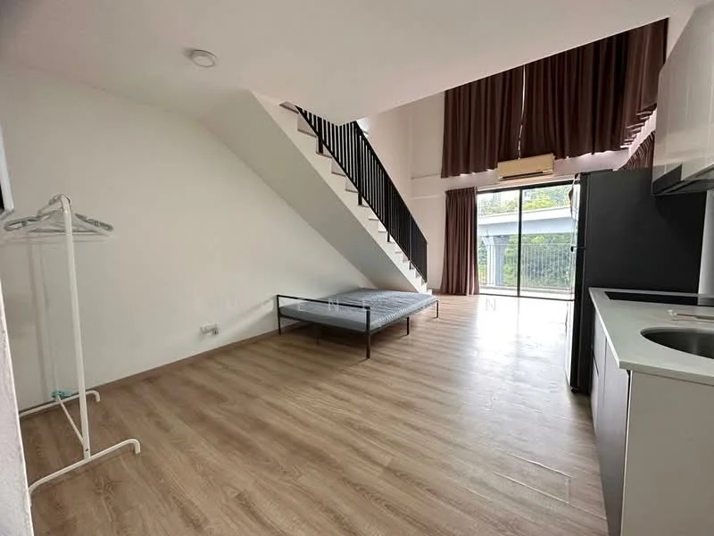 Room features: wooden flooring, white painted walls, large glass sliding door, floor-to-ceiling windows, brown curtains, staircase with black railing, air conditioning unit, open layout, kitchenette with sink, refrigerator, single bed frame without mattress, clothes rack; style: modern; view: garden.