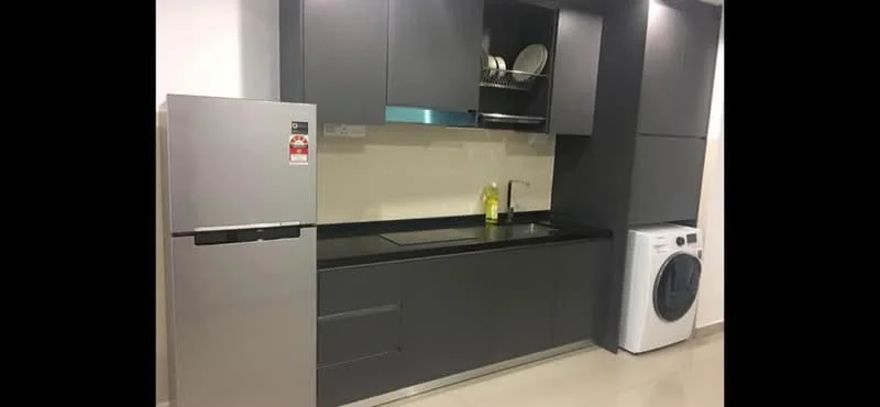 Kitchen features: grey flat-panel cabinets, black countertop, single-bowl stainless-steel sink, chrome pull-down faucet, stainless-steel fridge, front-load washing machine, open shelving, ceramic tile flooring, white painted walls, recessed downlights; style: modern.