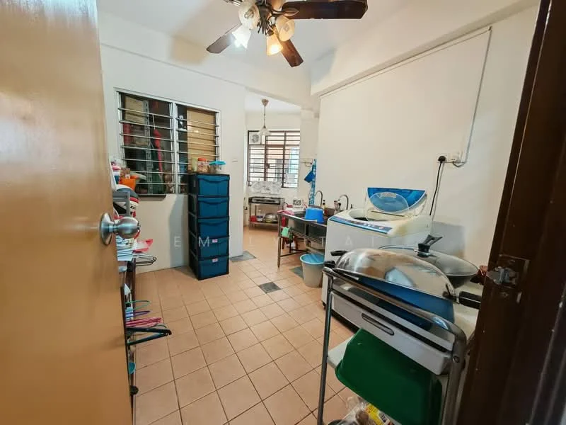 Laundry features: tiled flooring, white walls, ceiling fan with light, window with metal grille, sink with faucet, washing machine, blue storage cabinet, plastic storage bins, folding table, cleaning supplies, laundry baskets.