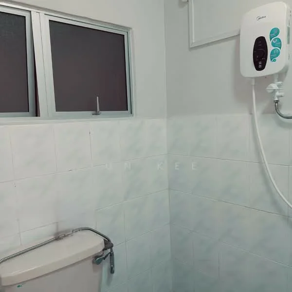Bathroom features: white tiled walls, light grey tiled flooring, one-piece toilet, shower with water heater, window for natural light, chrome faucet, wall-mounted mirror, toilet paper holder.