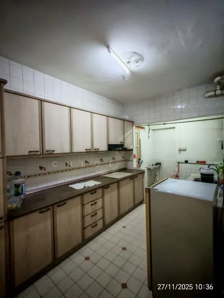 Kitchen features: laminate cabinetry in light wood finish, white tiled backsplash, laminate countertop, single-bowl stainless-steel sink, chrome faucet, built-in oven, freestanding refrigerator, ceramic tile flooring, fluorescent ceiling light, wall-mounted cabinets, open shelving, utility area with plumbing connections.