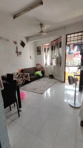 Living features: white painted walls, glossy white tile flooring, 5-blade ceiling fan, sofa in brown fabric, area rug with geometric pattern, window with sheer curtains, sliding glass door, decorative wall art, coffee table, TV console, laundry area visible through window; style: minimalist; view: garden.