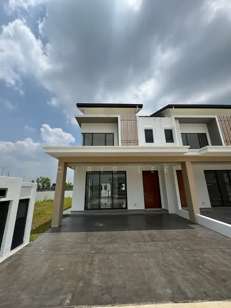 Exterior type: semi-detached house; features: white painted facade, glass windows, flat roof, concrete flooring, projecting balconies, mature greenery in background, driveway, single-storey, main entrance door, large front yard; style: modern.