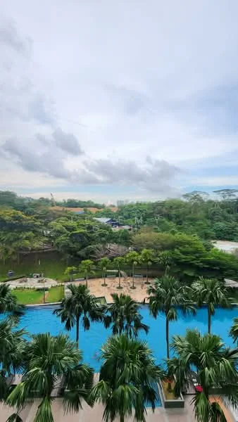 Exterior features: swimming pool, lush greenery, palm trees, landscaped garden, outdoor seating area, water features, city skyline in background; style: tropical-modern.