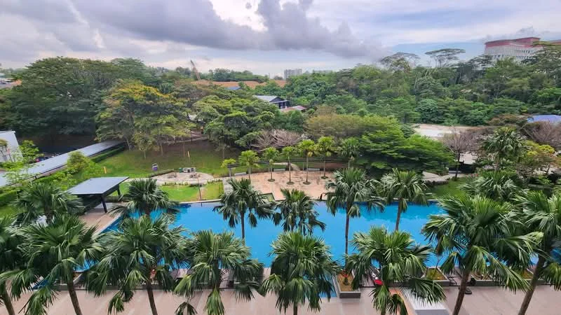Exterior type: swimming pool deck; features: infinity pool, palm trees, landscaped garden, pool deck with loungers, surrounded by greenery, children's playground, jogging track; style: tropical-modern.