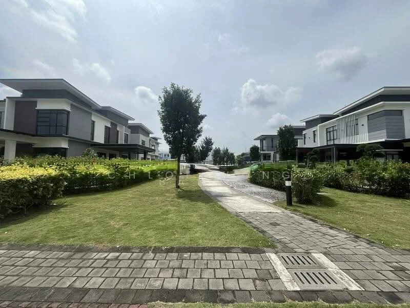 Exterior type: linked terrace house; features: manicured lawn, mature trees, paved walkway, concrete pathway, surrounding greenery, two-storey houses, modern architectural design, driveway with interlocking pavers; style: modern.