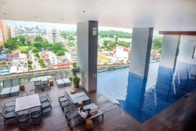 Exterior type: high-rise condominium; features: infinity pool, pool deck with loungers, outdoor dining area with table and chairs, wooden decking, city skyline view, surrounded by greenery; style: modern.